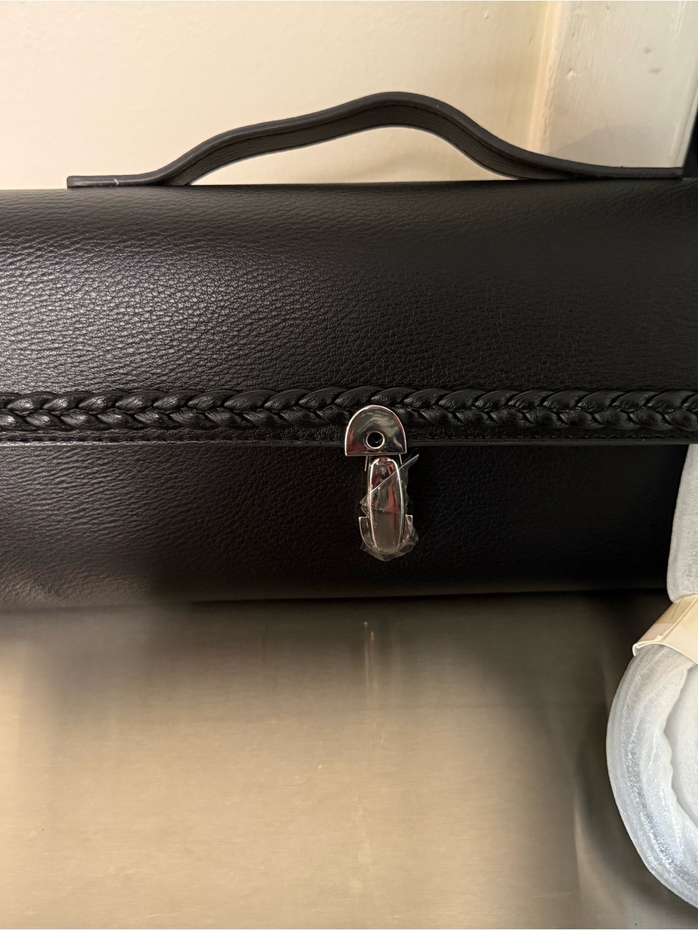 BCBG Black Braided-Trim Leather Wristlet Clutch with Silver Lock